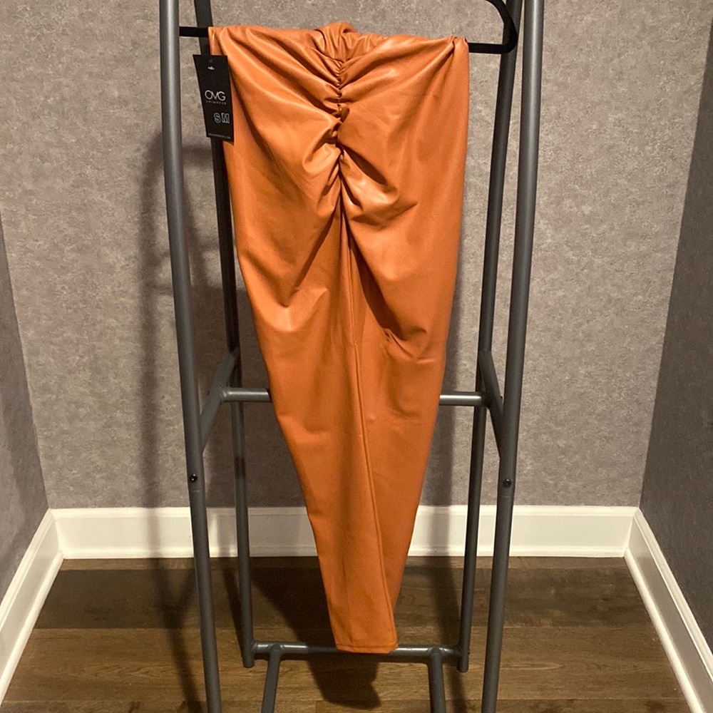 Burnt orange faux leather leggings, scrunch back. Size small/medium